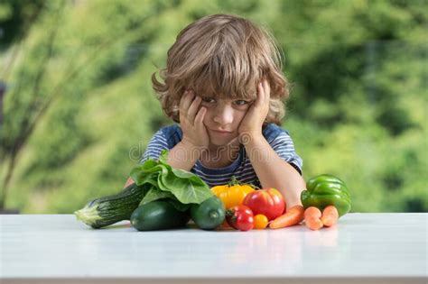 Little Boy Unhappy With Vegetable Meal Stock Image Image Of Little