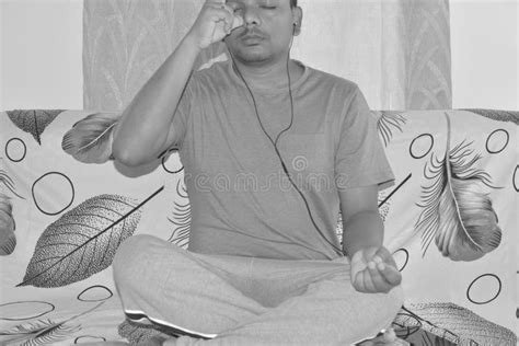 Attractive Young Indian Man Doing Yoga Stretching Yoga Online At Home