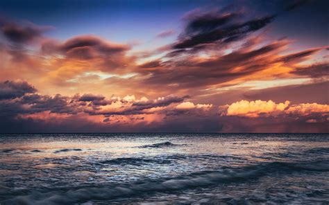 Download Wallpaper 3840x2400 Sea Sunset Waves Clouds Dusk 4k Ultra