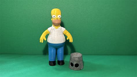 Archivo STL Homer Simpson Con Un Cubo Pegado A La CabezaModelo De