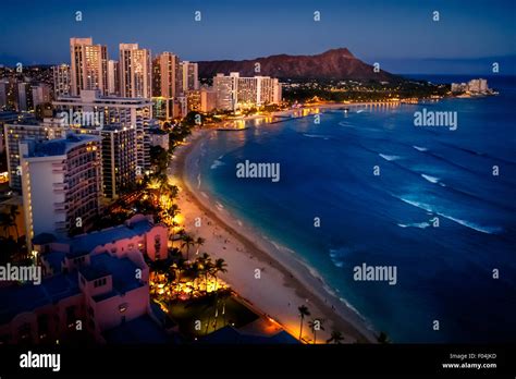 Waikiki Beach And Cityscape At Night Honolulu Hawaii Usa Stock Photo