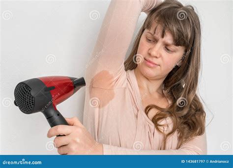 Woman Is Drying Her Sweating Armpit With Hair Dryer Stock Image Image