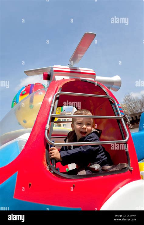 Boy Riding Carousel Stock Photo Alamy