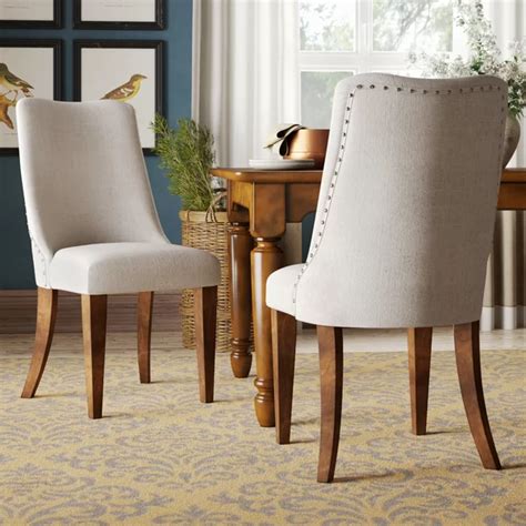 The seat cushion and included throw pillow are upholstered in polyester and are filled with foam for just the right amount of. Forestville Upholstered Dining Chair & Reviews | Birch ...