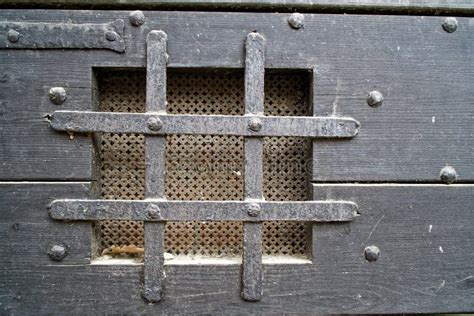 Medieval Window In Door With Iron Grid For Safety Stock Image Image