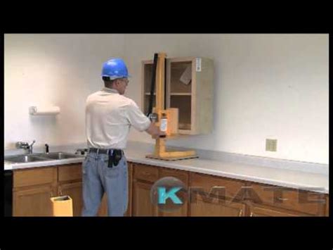 Measure up from where you marked your floor's highest point and use a pencil, marker, chalk, or laser level to mark a line across your wall. Commercial kitchen cabinet installation by KMate - YouTube