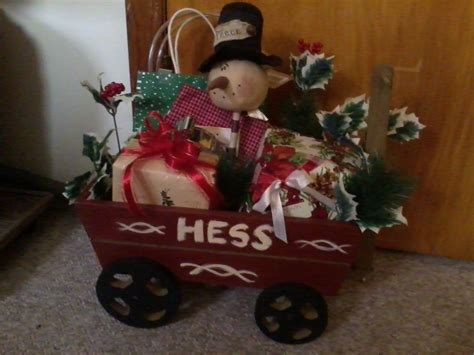 Christmas decorations, ornaments, stockings & more. gift wagon | Christmas ornaments, Holiday decor, Christmas