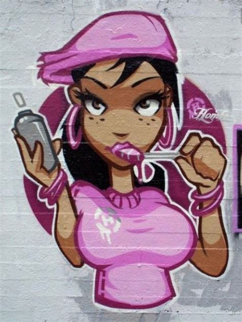 Graffiti On The Side Of A Building Depicts A Woman Holding A Cell Phone