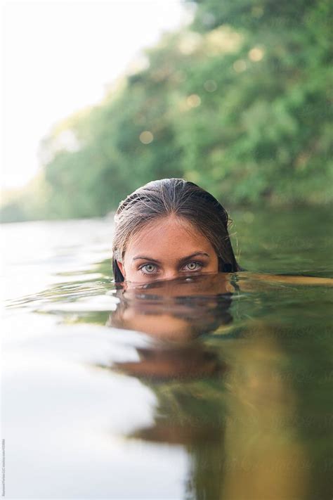 Beautiful Eyes Of Girl Submerged In Lake By Stocksy Contributor Raymond Forbes Llc Water