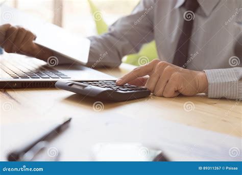 businessman analyzing financial data on digital tablet and count stock image image of report