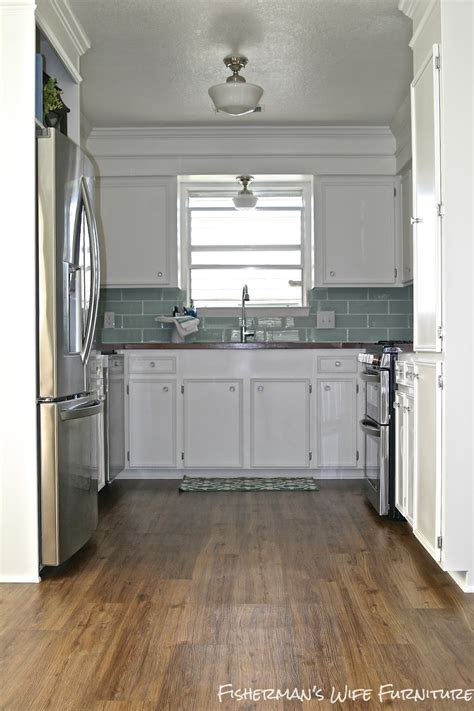 Move the big things into manageable positions. Remodelaholic | Small White Kitchen Makeover with Built-In ...