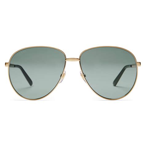 gucci aviator glasses with web detail metal color gold grey lenses gucci eyewear avvenice