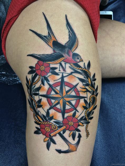 Compass And Bird Tattoo On Thigh Tattoo Designs Tattoo Pictures