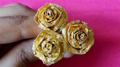 Candy wrappers can be used to make a variety of crafts such as purses and jewelry. DIY Rose from Chocolate Wrapper - YouTube