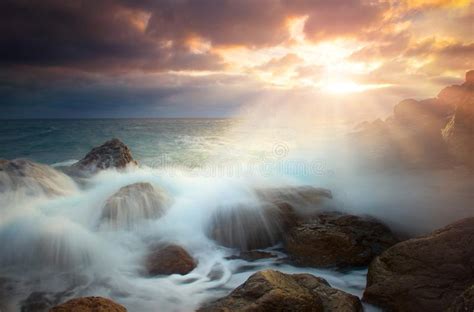 Seascape With Stormy Sea At Sunset Stock Photo Image Of Bright