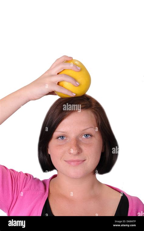 Women Holding An Apple On Her Head Stock Photo Alamy