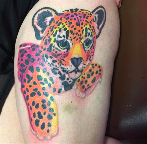 Artist makes clay beads with animal prints inside. 15 Lisa Frank Tattoos That Will Make the Preteen Girl in ...