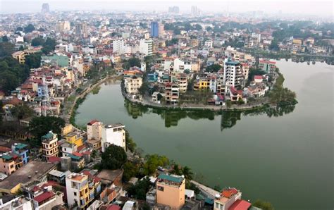 Photographs Of West Lake Ho Tay In Hanoi Boats Sunset