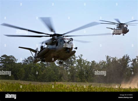 Two Us Marine Corps Ch 53e Super Stallion Helicopters Attached To