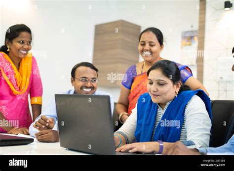 Happy Smiling Group Of Corporate Employees During Meeting At Office