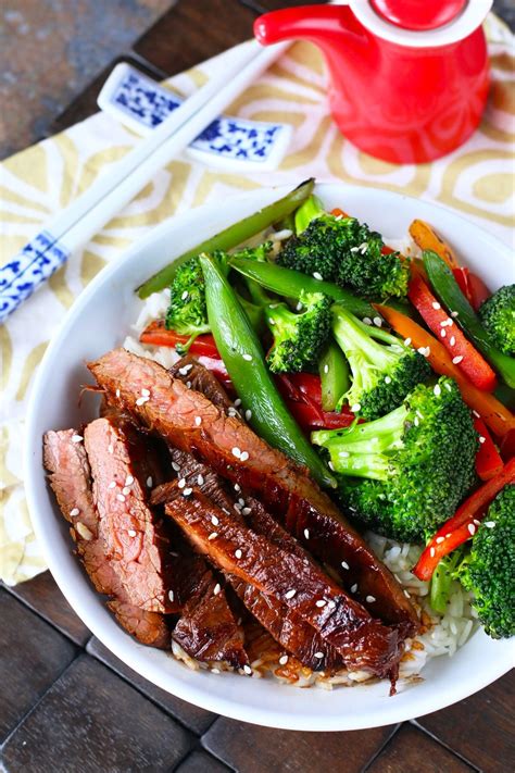 Put the boiled rice into a deep dish, place the salmon on top, pour the sauce over it and sprinkle with mint. Soy Marinated Flank Steak Stir-Fry | Recipe | Marinated flank steak, Steak stir fry, Beef recipes