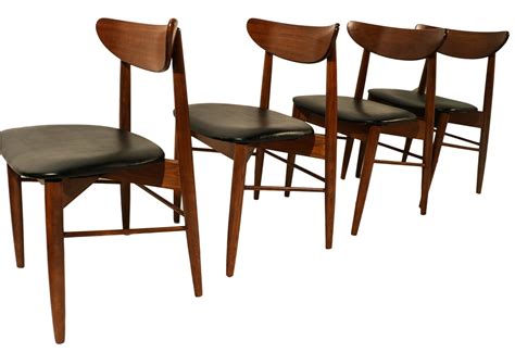 It blends smooth designs with highly varied textures, materials, and colors. Lane Mid Century Modern Walnut Dining Chairs