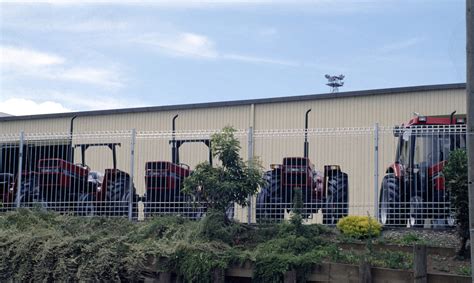 < cyclone , a trademark for such a fence  a heavy duty , chain link fence , usually high and often topped with barbed wire … Cyclone Wire - Panel Fencing