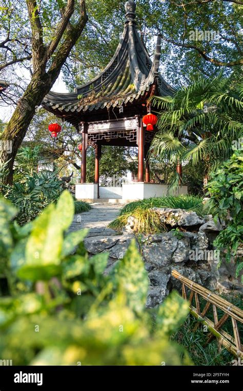 Traditional Chinese Pavilion In Traditional Garden At Daylight Stock
