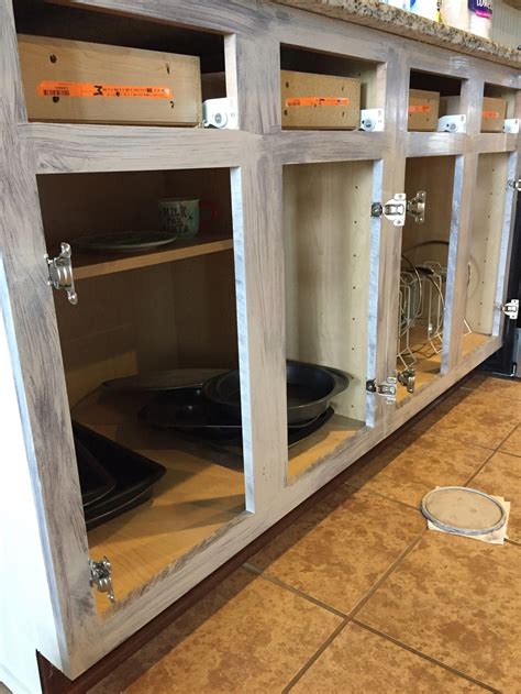 Let it dry for 24 hours. A tutorial on how to paint cheap laminate cabinets with no ...