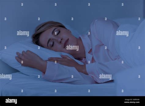 Mature Woman Sleeping Night High Resolution Stock Photography And