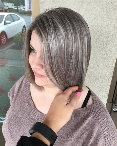 Added some grey highlights to help blend her natural grey hair ...