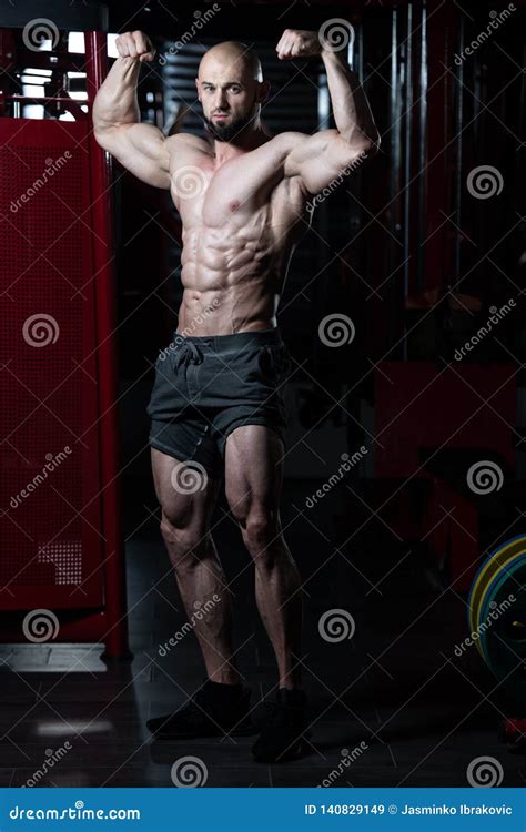 Muscular Men Is Hitting Rear Double Bicep Pose Stock Image Image Of