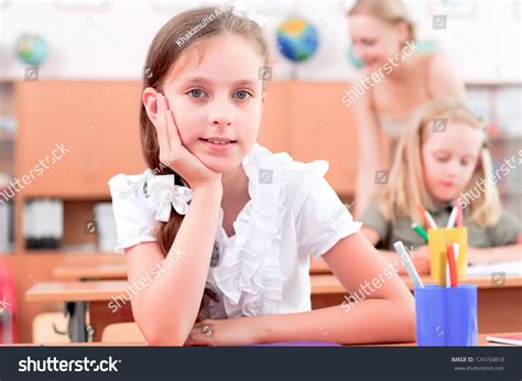 Portrait Students Classroom Sit School Desks Stock Photo 124154818