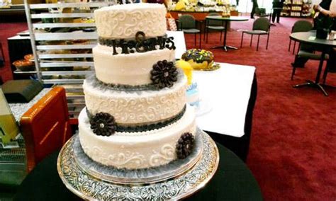 The handle of the bouquet is wrapped with twine, lace and added pearls. Winn Dixie Wedding Cakes - Wedding and Bridal Inspiration