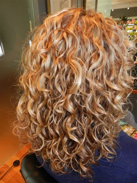 medium length blonde curls highlights lowlights dry cutting and deva curl styled by katt of