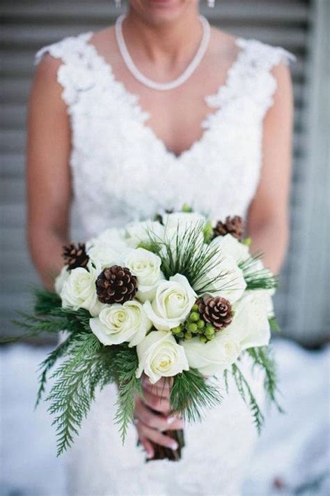 White Roses Pine Cones And Fur Winter Wedding Bouquet