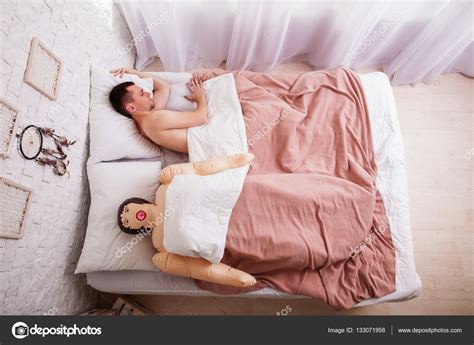Man Sleeping In Bed With Sex Doll Stock Photo By Nomadsoul