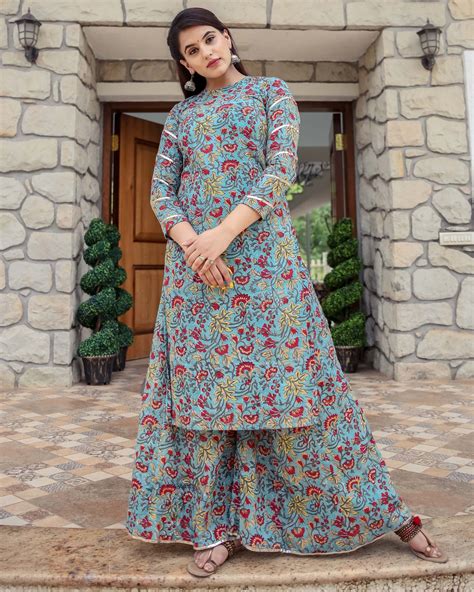 Blue Floral Printed Kurta And Flared Palazzo Set Of Two By Ambraee