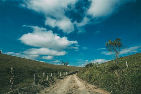 2000x1157 Clouds Daylight Field Grass Landscape Mountains