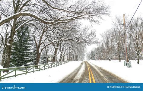 Snowy Winter Road Scene With Yellow Stripe Stock Image Image Of Snow