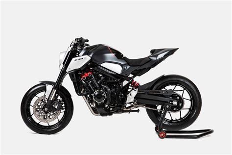 The burnished aluminium radiator shrouds have been made more compact, and forward facing, a design cue mirrored by the. HONDA NEO SPORTS CAFE 650: Πρωτότυπο... παραγωγής ...