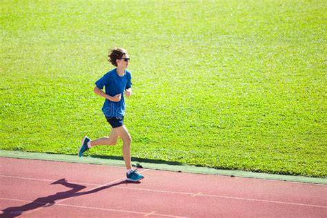 Teenager Boy Running On Race Track Kids Run Stock Image Image Of
