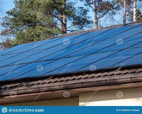 Roof With Mounted And Installed Photovoltaic Solar Panels On The Roof