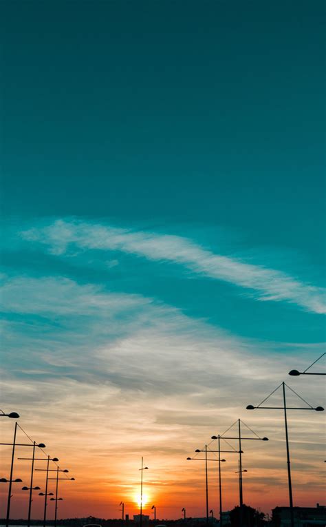 Download Wallpaper 950x1534 Sunset Landscape Skyline Iphone
