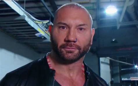 Dave Batista Returns To Wwe And Assaults Ric Flair On His