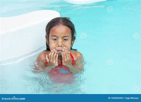 Young Multiracial Girl Child Learning To Swim Stock Photo Image Of
