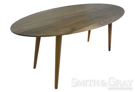 Walnut Oval Dining Table With Turned Tapered Legs Smith And Gray