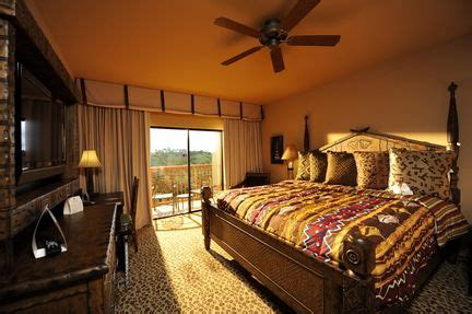 Use animal covered wrapping paper to decorate further and use a safari hat and a pair of binoculars for further effect. African themed Bedroom | Bedroom themes, Safari bedroom ...