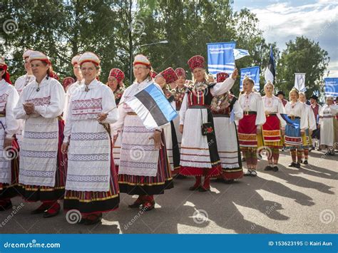 Estonian Folk Singers And Dancers At The Song Festival Grounds In