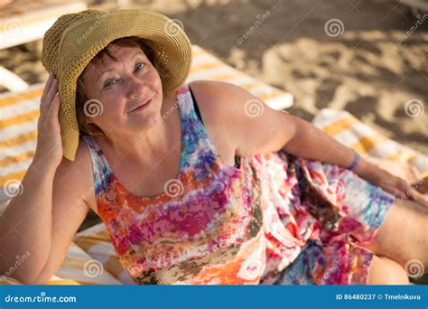Smiling Old Woman At Beach On Sunbed Stock Image Image Of Idyllic Feminine